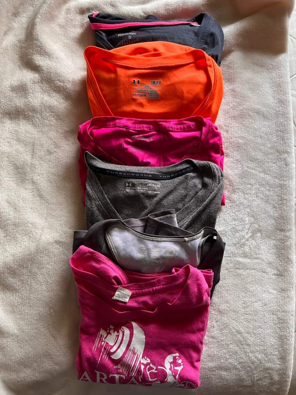 Bundle of athletic t-shirts